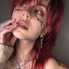 BIOMECH SPINE EARRINGS